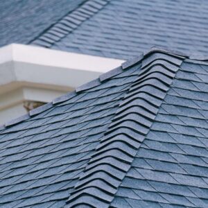 Close-up of a newly installed asphalt shingle roof with clean ridge cap detail on a residential home. Ryan Construction Systems specializes in high-quality roofing installation and replacement throughout Kansas City, Parkville, Liberty, Platte City, and surrounding suburbs. Trust your local roofing contractor near you for expert craftsmanship and long-lasting results.