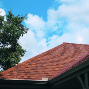 Close-up view of a Kansas City roof valley with new shingles and guttering, completed by Ryan Construction Systems.